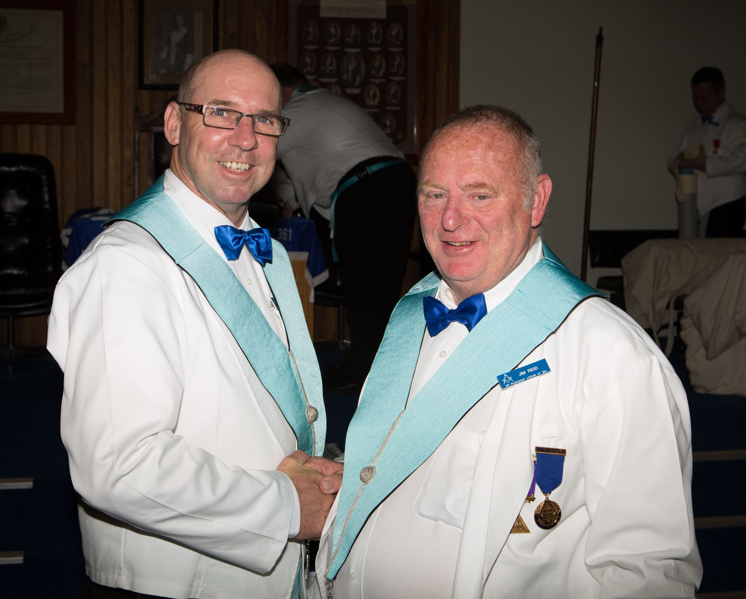 Bro Chris Eades being congratulated by the WM on being invested as Inner Guard